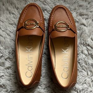 Calvin Klein Brown Leather Slip-On Loafers with Gold Ring Accent